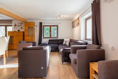 Ein Sitzbereich in der Unterkunft Apartments Garden House