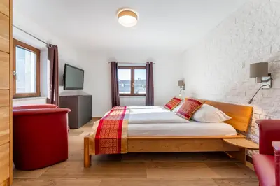 Ein Bett oder Betten in einem Zimmer der Unterkunft Apartments Garden House