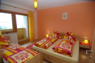 Ein Bett oder Betten in einem Zimmer der Unterkunft Landhaus Oberlehen