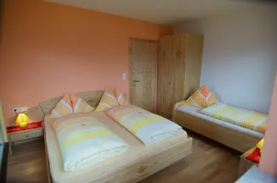 Ein Bett oder Betten in einem Zimmer der Unterkunft Landhaus Oberlehen
