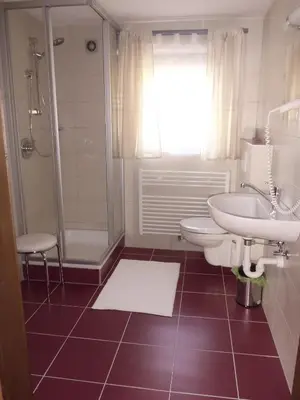 Ein Badezimmer in der Unterkunft Haus Bianca