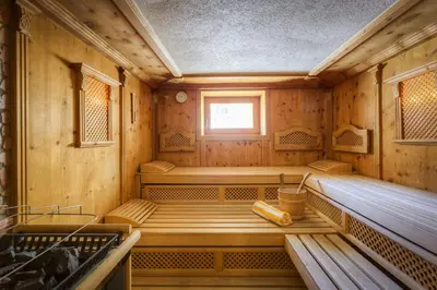Ein Bett oder Betten in einem Zimmer der Unterkunft Hotel Barbarahof Saalbach