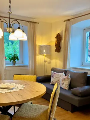 Ein Sitzbereich in der Unterkunft Gasthof Neumeister