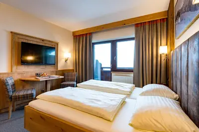 Ein Bett oder Betten in einem Zimmer der Unterkunft Gasthaus Hotel Oberwirt