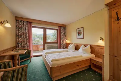 Ein Bett oder Betten in einem Zimmer der Unterkunft Gasthaus Hotel Oberwirt