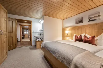 Ein Bett oder Betten in einem Zimmer der Unterkunft Zillertaler Hofchalets Schustererhof