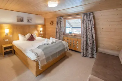 Ein Bett oder Betten in einem Zimmer der Unterkunft Zillertaler Hofchalets Schustererhof