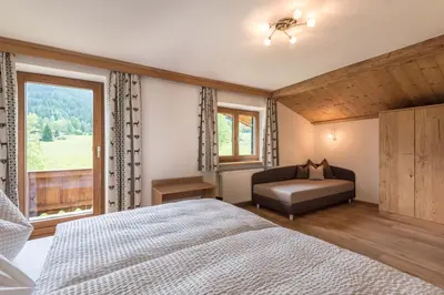 Ein Bett oder Betten in einem Zimmer der Unterkunft Apartments Foidl