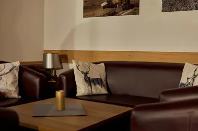 Ein Sitzbereich in der Unterkunft Parkhotel Kirchberg
