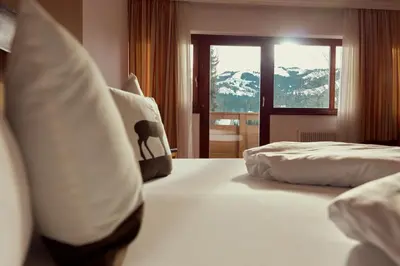 Ein Bett oder Betten in einem Zimmer der Unterkunft Parkhotel Kirchberg