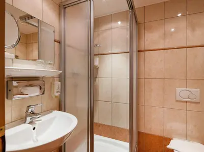 Ein Badezimmer in der Unterkunft Hotel Kroneck