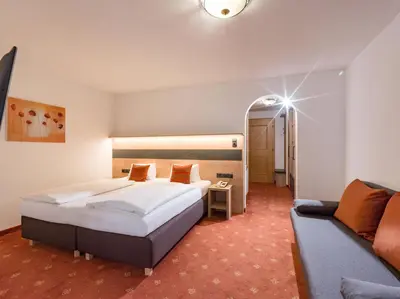 Ein Bett oder Betten in einem Zimmer der Unterkunft Lifthotel