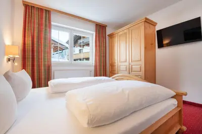 Ein Bett oder Betten in einem Zimmer der Unterkunft Appart Stephan