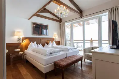 Ein Bett oder Betten in einem Zimmer der Unterkunft Theresa Wellness-Genießer-Hotel