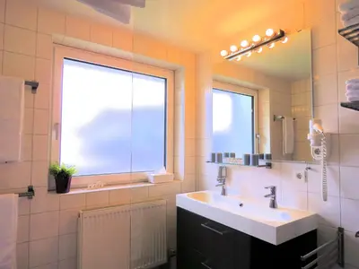 Ein Badezimmer in der Unterkunft Moida-Ferienwohnung
