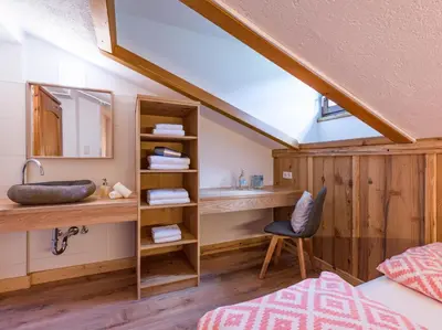 Ein Bett oder Betten in einem Zimmer der Unterkunft Berg'k'hof Kaisertal - Alpine Hideaway