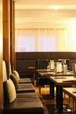 Ein Sitzbereich in der Unterkunft Hotel Auwirt Zentrum