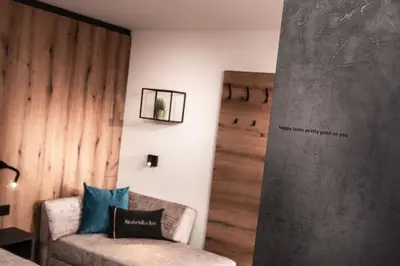 Ein Sitzbereich in der Unterkunft Apartments Niederseer