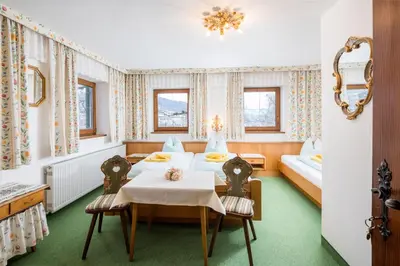 Ein Bett oder Betten in einem Zimmer der Unterkunft Pension Rainhof