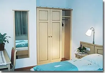 Ein Bett oder Betten in einem Zimmer der Unterkunft Gästehaus-Pension Bendler