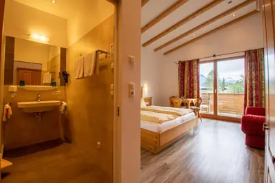 Ein Bett oder Betten in einem Zimmer der Unterkunft Pension Noella