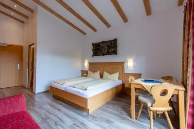 Ein Bett oder Betten in einem Zimmer der Unterkunft Pension Noella