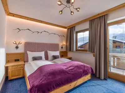 Ein Bett oder Betten in einem Zimmer der Unterkunft Appartements Alpenschlössl