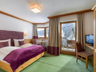 Ein Bett oder Betten in einem Zimmer der Unterkunft Appartements Alpenschlössl