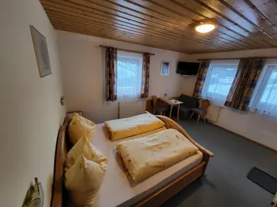 Ein Bett oder Betten in einem Zimmer der Unterkunft Hagauhof