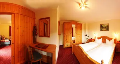 Ein Bett oder Betten in einem Zimmer der Unterkunft Pension Sonnleit'n