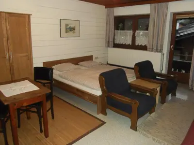 Ein Bett oder Betten in einem Zimmer der Unterkunft Binderhof