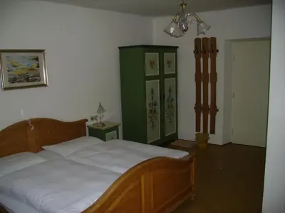 Ein Bett oder Betten in einem Zimmer der Unterkunft Binderhof