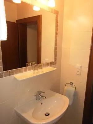 Ein Badezimmer in der Unterkunft Binderhof