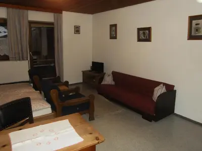 Ein Sitzbereich in der Unterkunft Binderhof