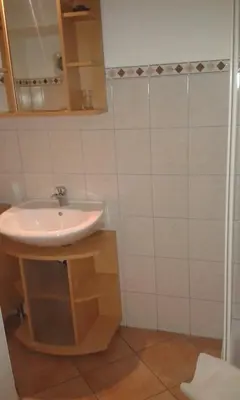 Ein Badezimmer in der Unterkunft Binderhof