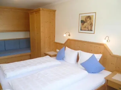 Ein Bett oder Betten in einem Zimmer der Unterkunft Appartement Alpenhof Wildschönau