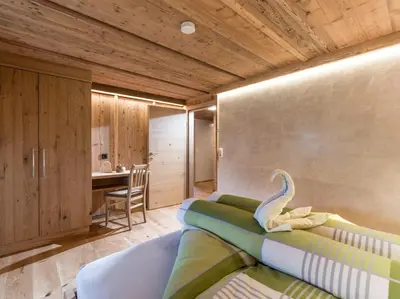Ein Bett oder Betten in einem Zimmer der Unterkunft Achrainer-Moosen