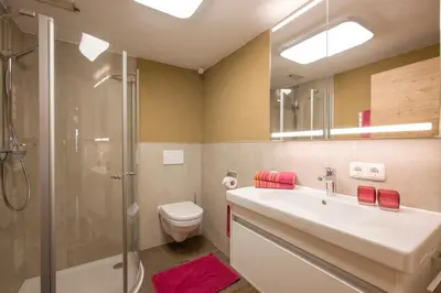 Ein Badezimmer in der Unterkunft Achrainer-Moosen