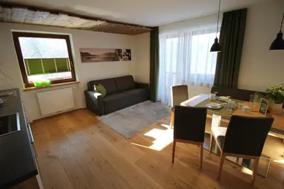 Ein Sitzbereich in der Unterkunft Ticklhof am See