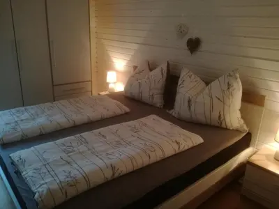 Ein Bett oder Betten in einem Zimmer der Unterkunft Haus Manfred