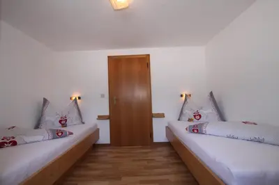 Ein Bett oder Betten in einem Zimmer der Unterkunft Pfandlhof