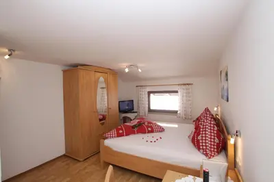 Ein Bett oder Betten in einem Zimmer der Unterkunft Pfandlhof