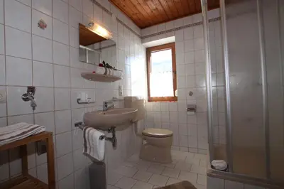 Ein Badezimmer in der Unterkunft Pfandlhof