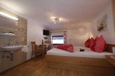 Ein Bett oder Betten in einem Zimmer der Unterkunft Pfandlhof