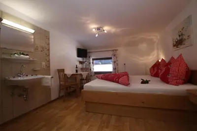 Ein Bett oder Betten in einem Zimmer der Unterkunft Pfandlhof