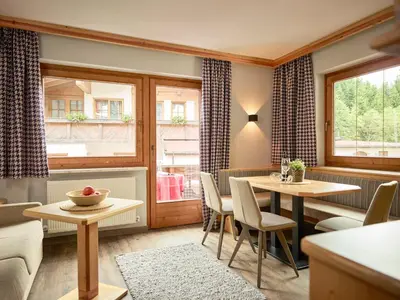 Ein Sitzbereich in der Unterkunft Boutique Appartments Gerlosperle