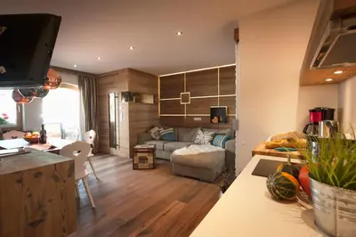 Ein Sitzbereich in der Unterkunft Boutique Appartments Gerlosperle