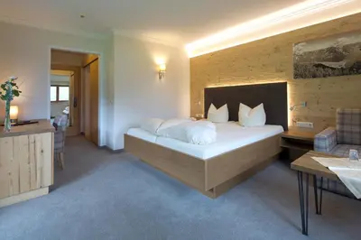 Ein Bett oder Betten in einem Zimmer der Unterkunft Hotel Bergland