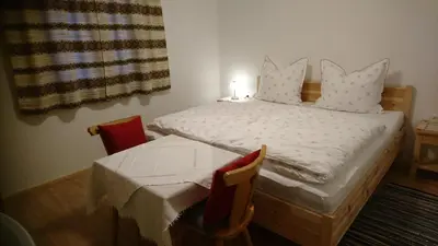 Ein Bett oder Betten in einem Zimmer der Unterkunft Ferienwohnung Höllwarth