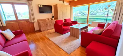 Ein Sitzbereich in der Unterkunft Appartements Achensee